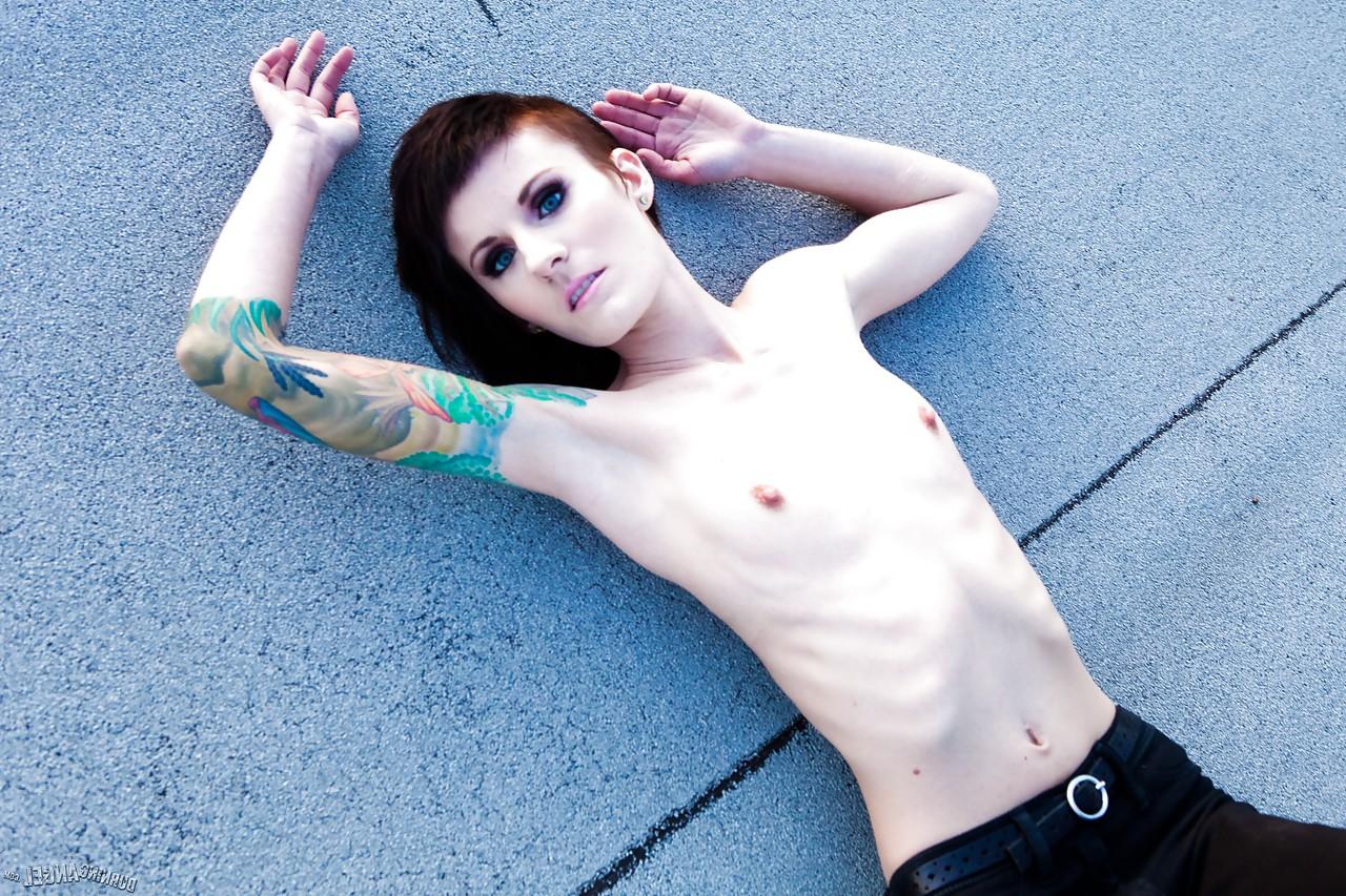 15P Skinny alt babe with tattooed body exposing tiny tits outdoors on rooftop
