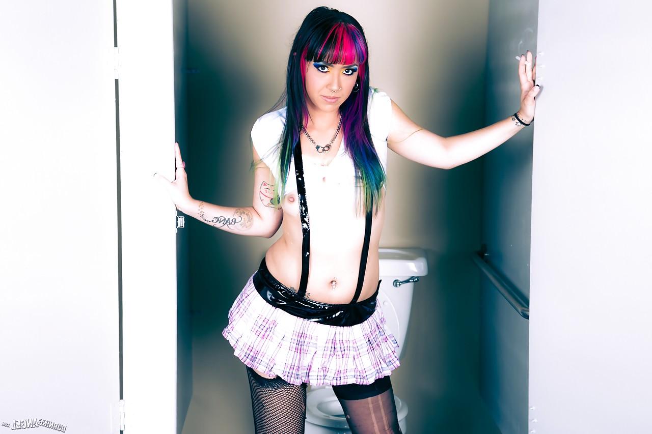 14P Skirt and ripped stockings attired alt babe Kiki Li flashing tiny tits