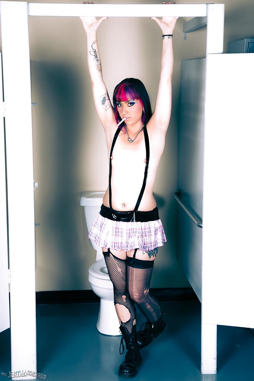 14P Skirt and ripped stockings attired alt babe Kiki Li flashing tiny tits