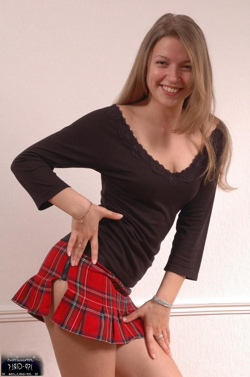 16P Cute girl Sarah shows off in her new plaid skirt