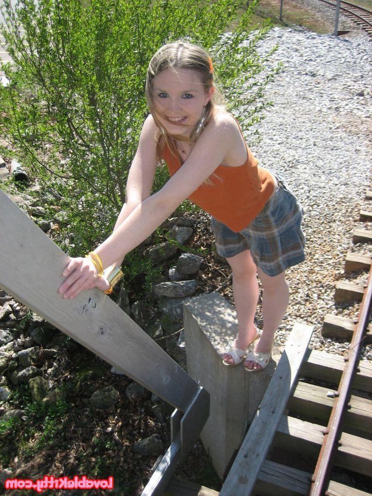15P Pictures of teen hottie Lovable Kitty showing you up her skirt