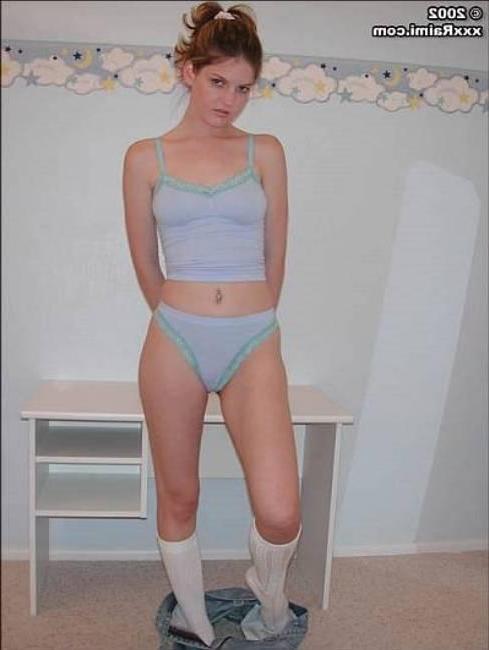 18P Raimi bends over to show you what\'s up her skirt before getting naked
