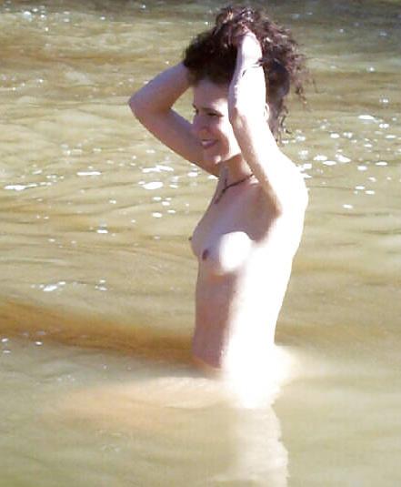 25P Brunette skinny-dipping in river