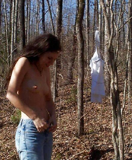 25P Brunette skinny-dipping in river