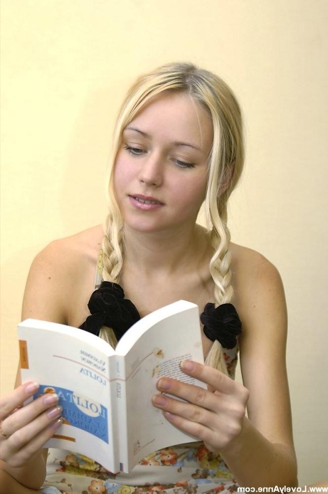 14P Anne Young chick reading a book naked