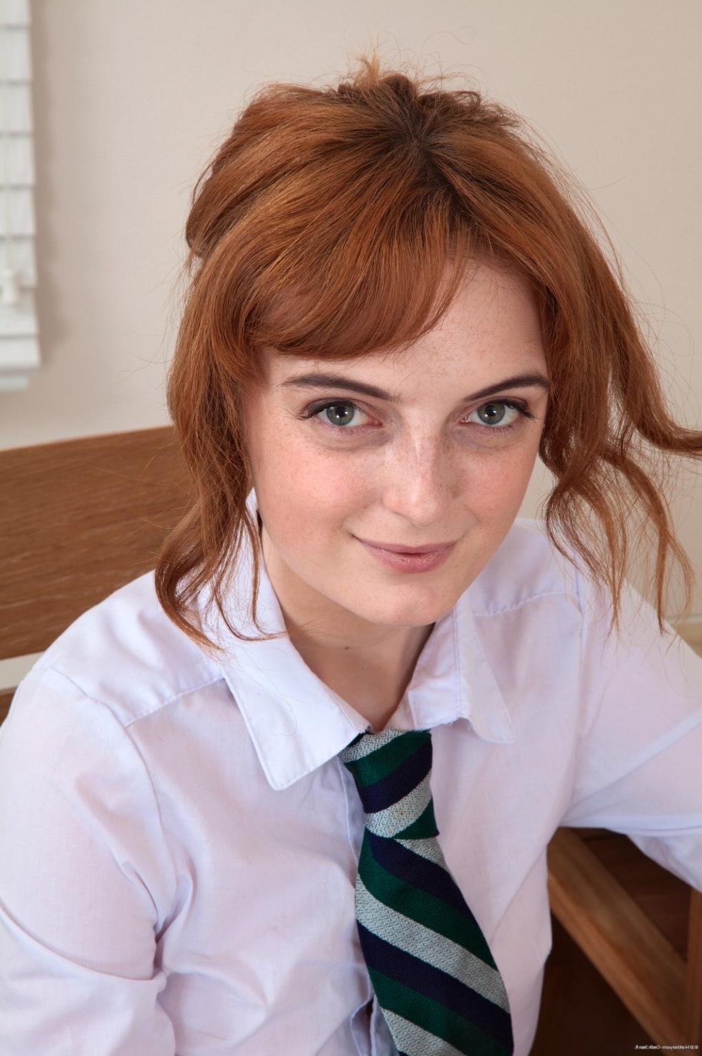 15P Hairy redhead amateur teasing in her panties in the office