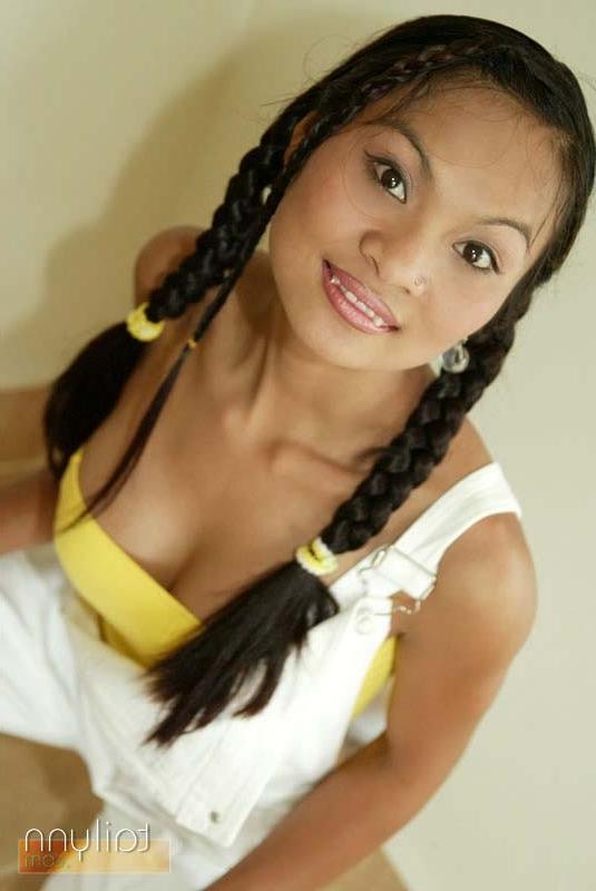 15P Sexy Thai girl Tailynn strips and gets naked