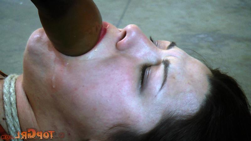 16P Dana Vixen is lying naked on a cold, stone floor and Sister Dee 