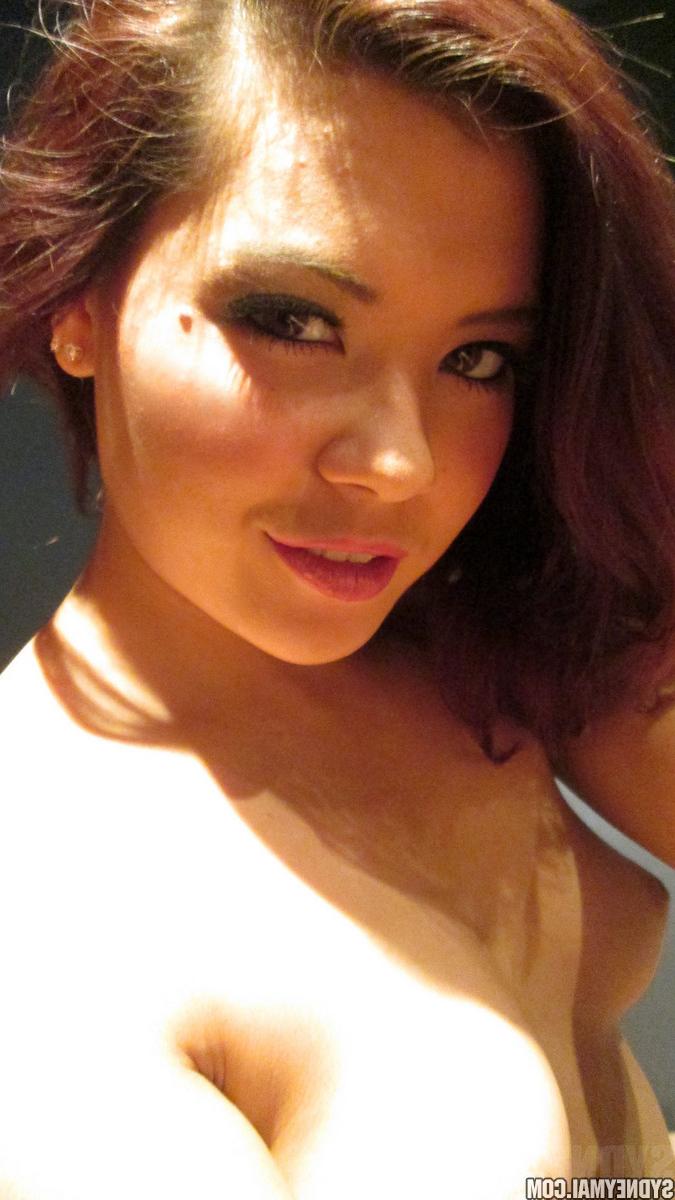 15P Beautiful Sydney Mai fingers her luscious pussy in closeup pics