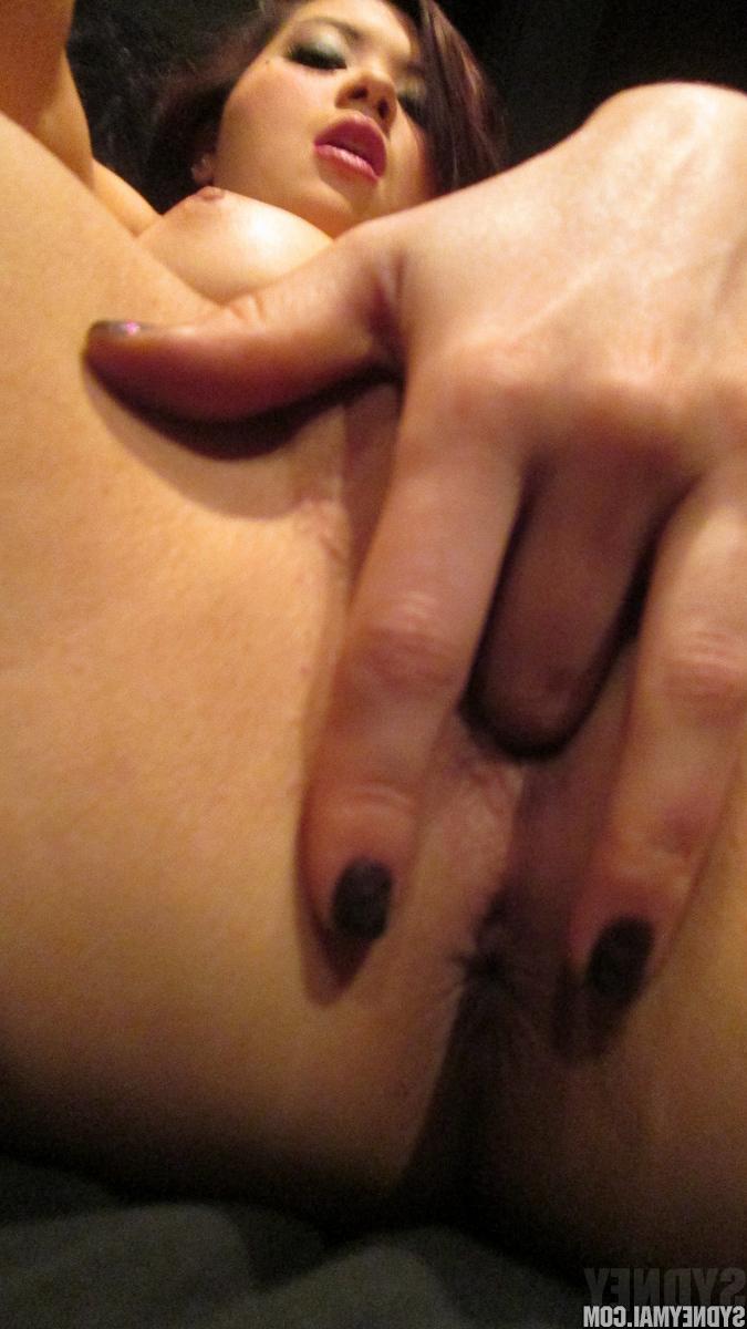 15P Beautiful Sydney Mai fingers her luscious pussy in closeup pics