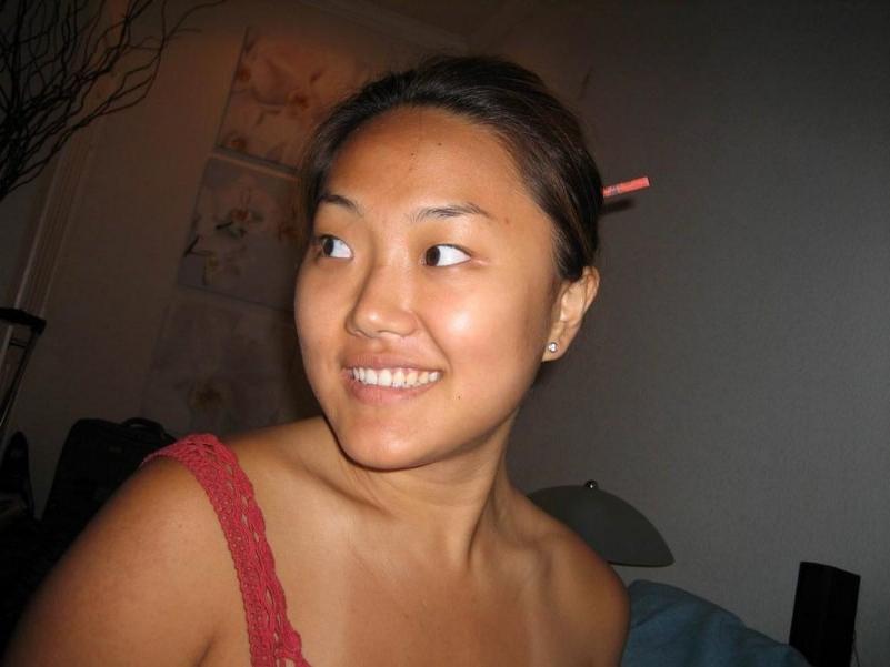 16P Asian does a stiptease befoe sliding her pussy on huge cock