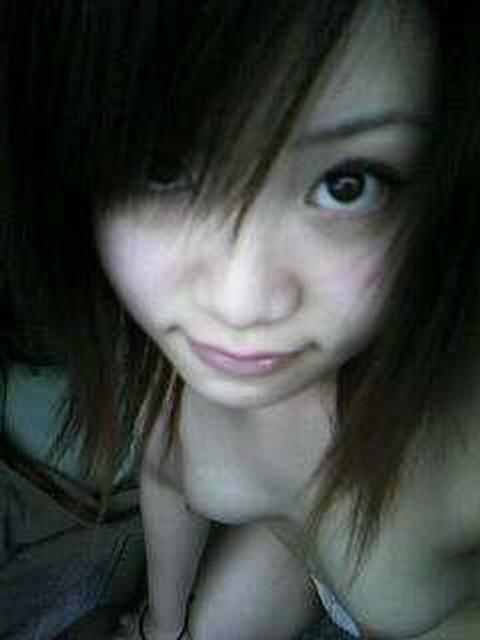16P Asian does a stiptease befoe sliding her pussy on huge cock