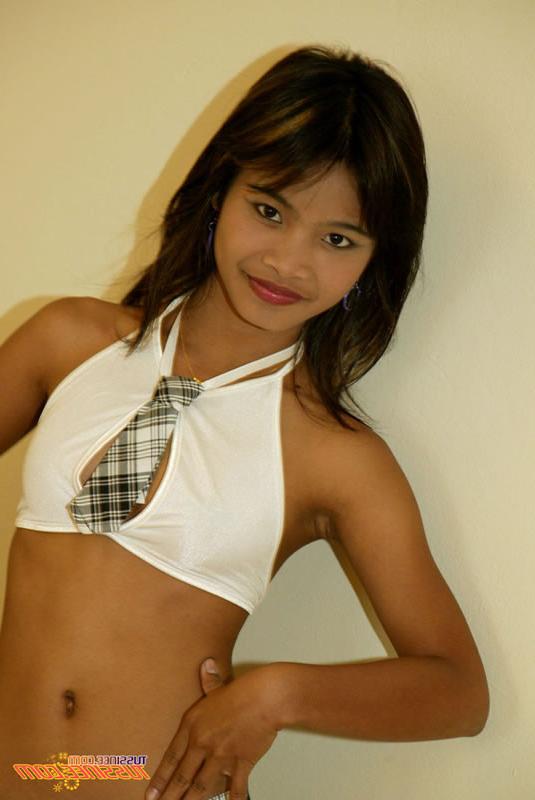 15P Asian teen in a school girl outfit trying to get some extra credit