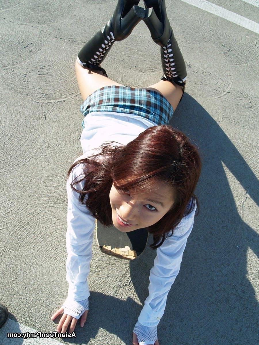 16P asian teen skateboarder in skirt
