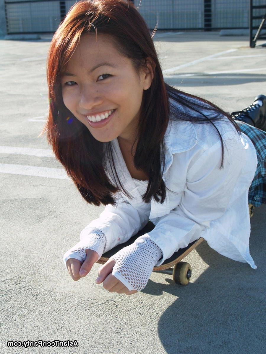 16P asian teen skateboarder in skirt