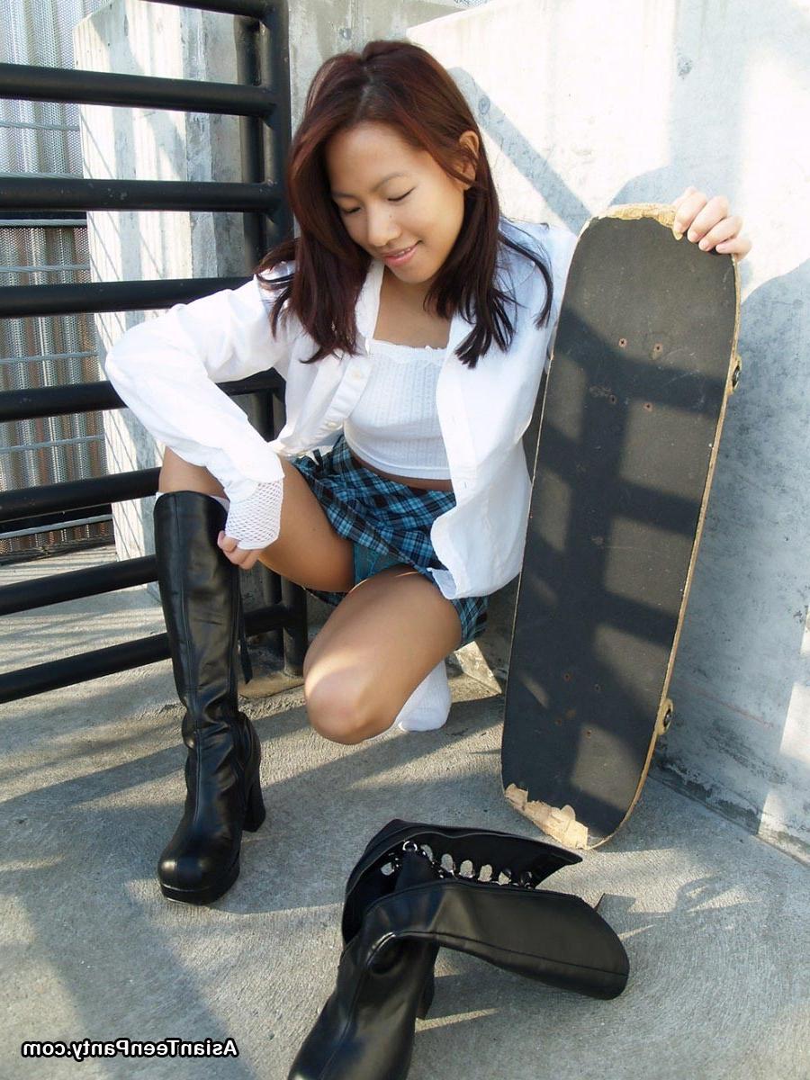 16P asian teen skateboarder in skirt
