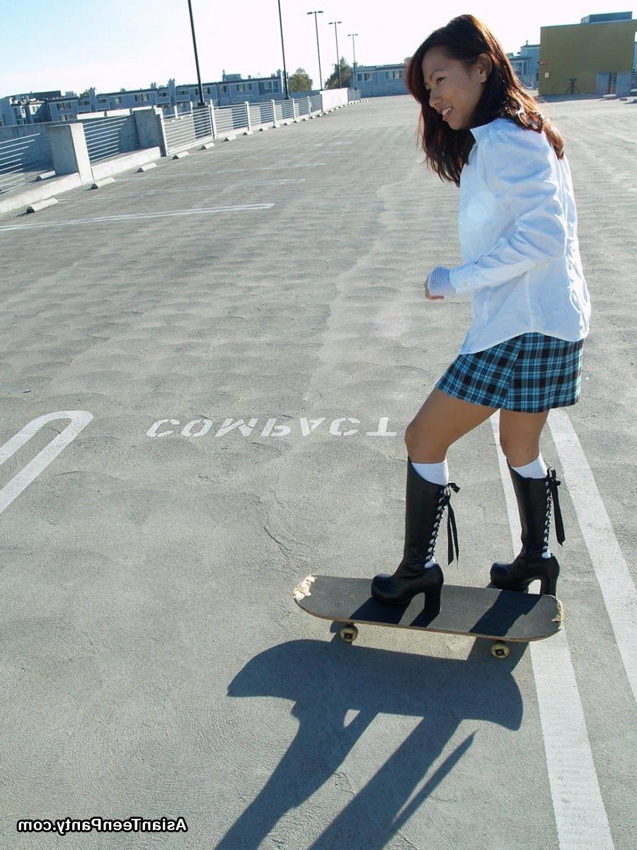 16P asian teen skateboarder in skirt