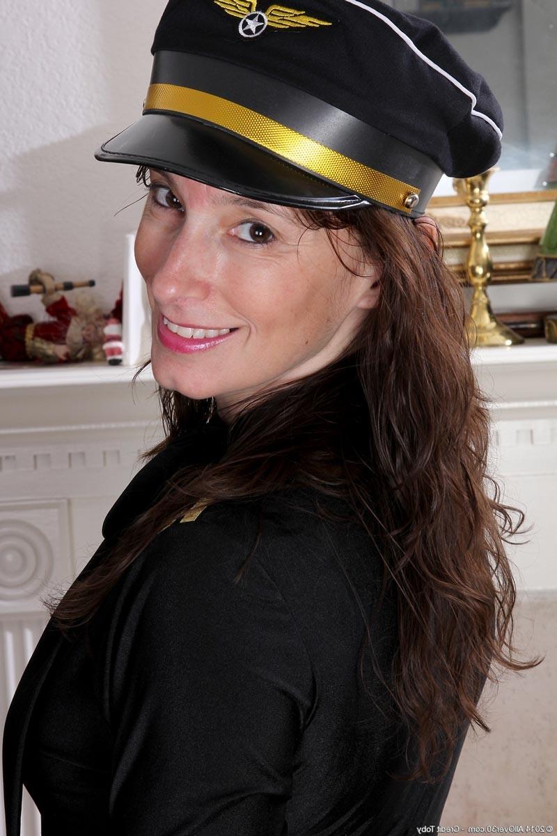15P Sexy milf strips off her sexy uniform