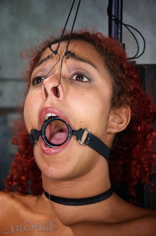 9P Daisy Ducati redhead in red latex dress and stockings bound masked made to squir
