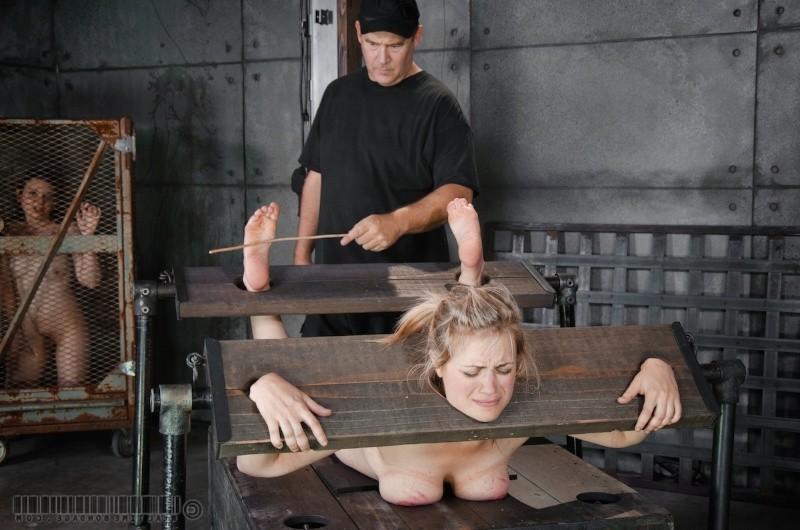 11P Winnie Rider is bound in wooden stocks gets feet and ass spanked