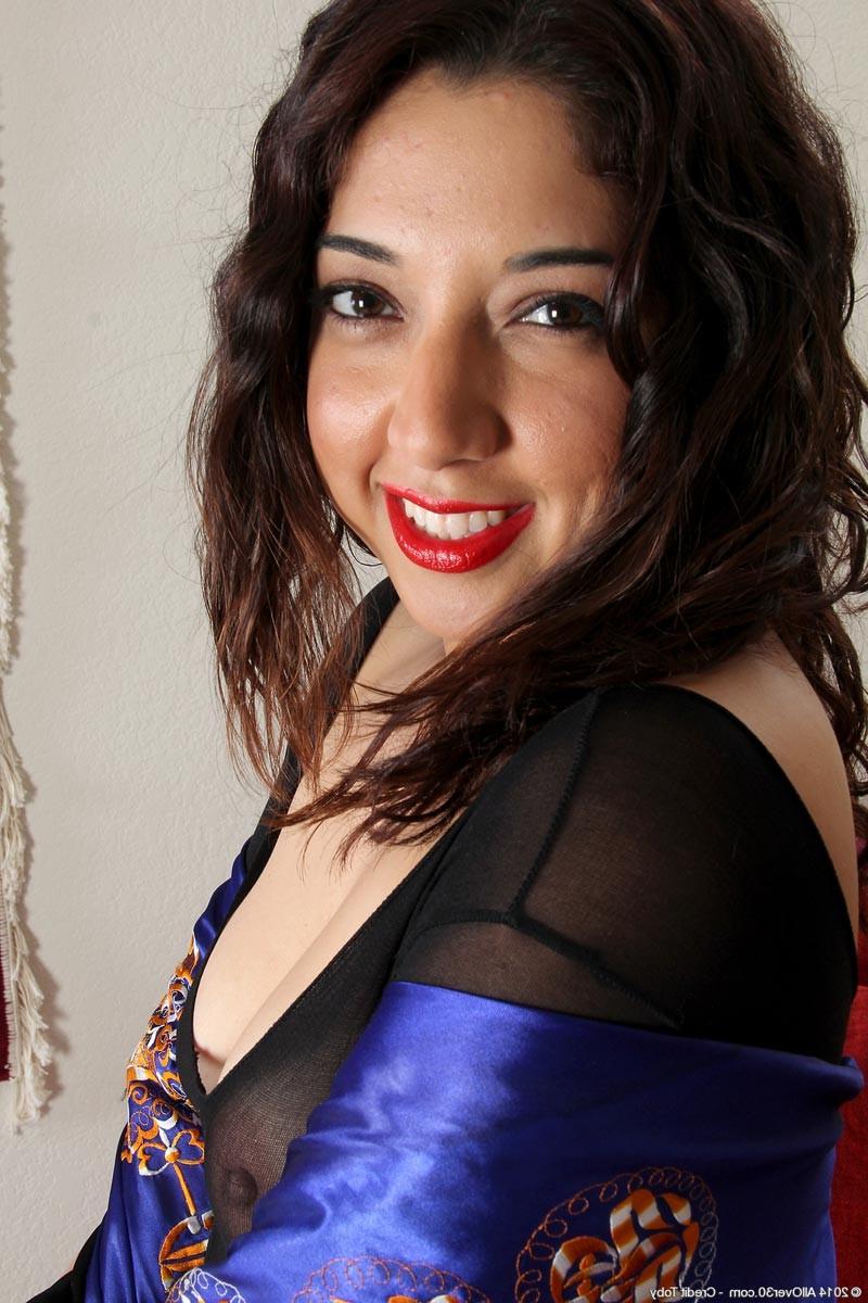 15P Horny exotic milf takes off her full body lingerie