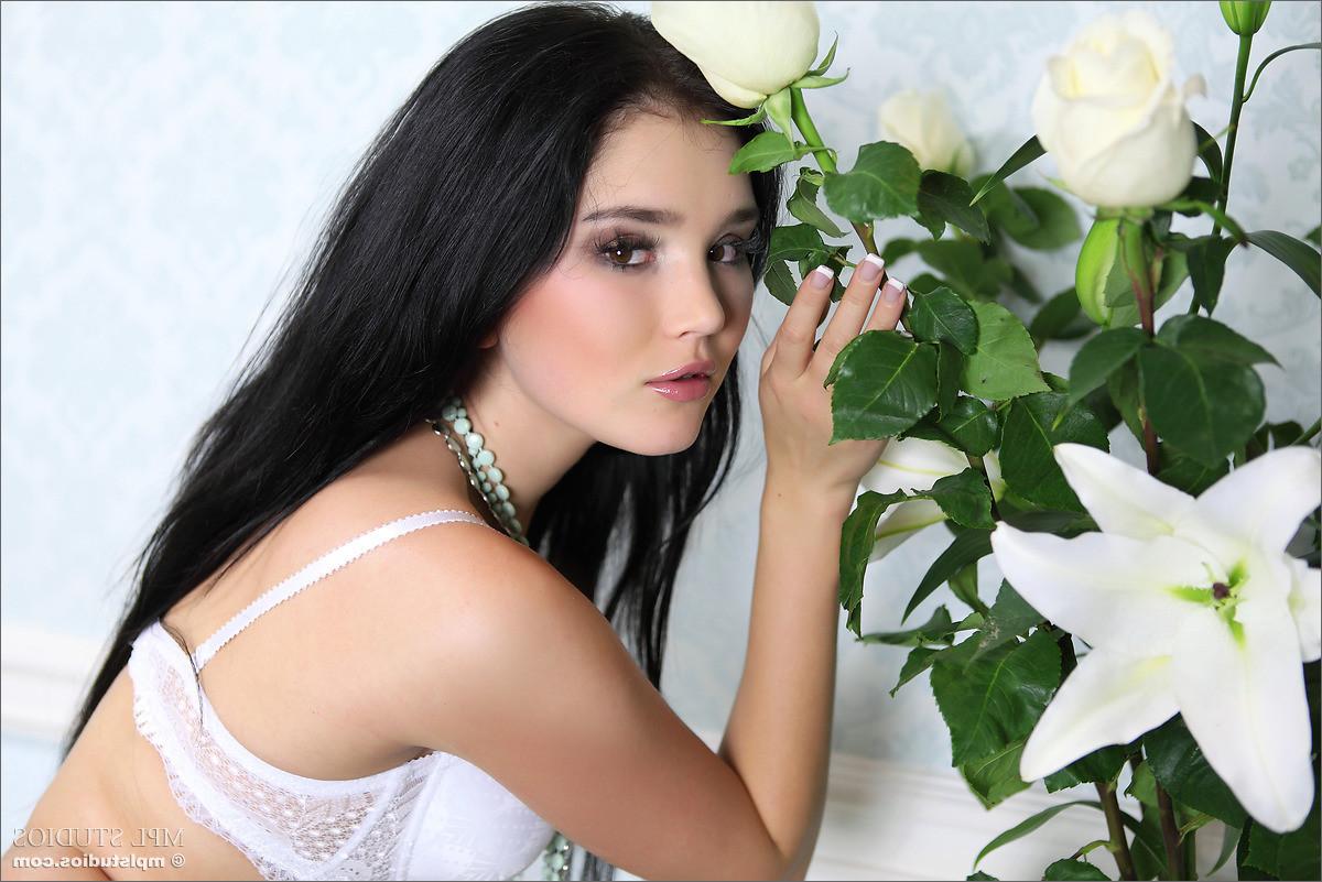 12P Raven haired beauty Malena strips off bra and panties