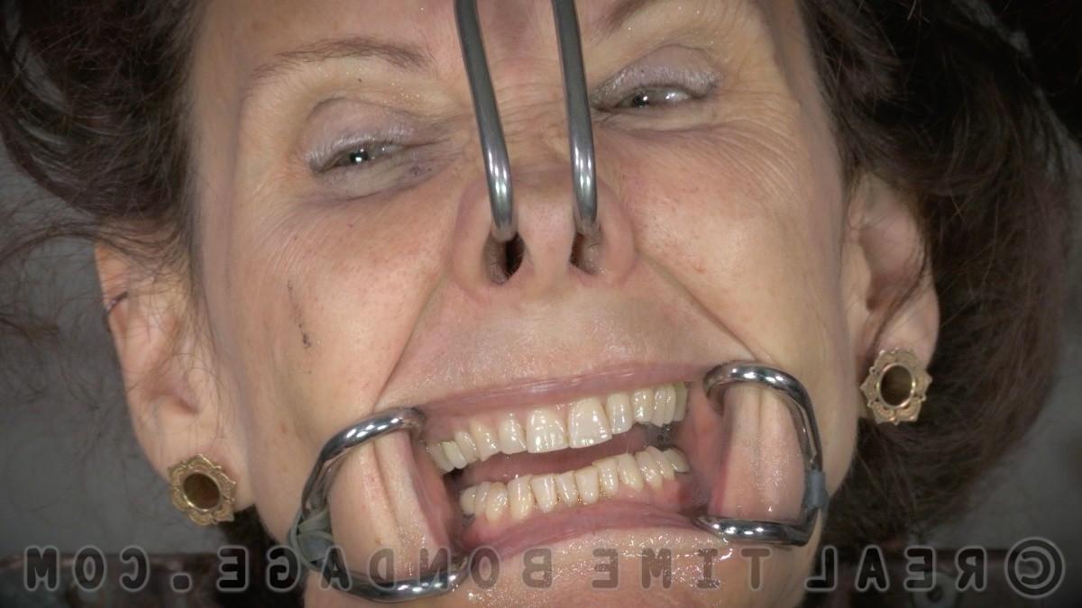 16P Emma Haize is bound in a dungeon with different sex toys