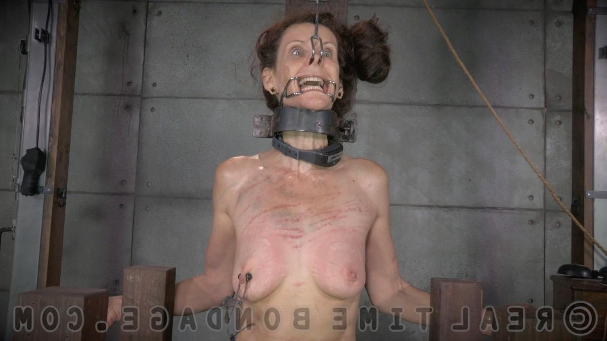 16P Emma Haize is bound in a dungeon with different sex toys