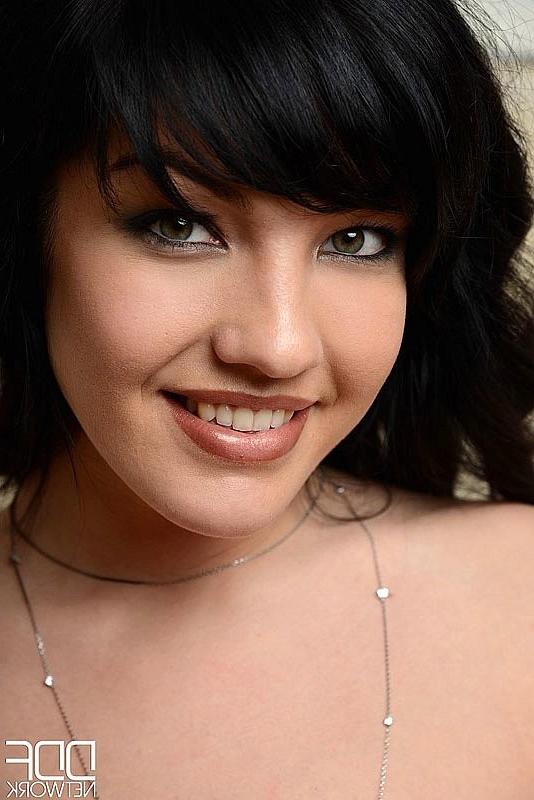 16P Coco Bianca beautiful russian babe strips and plays with a blue dildo