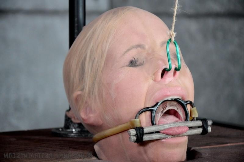 16P Simone Sonay blonde milf is chain and strap bound in bdsm dungeon