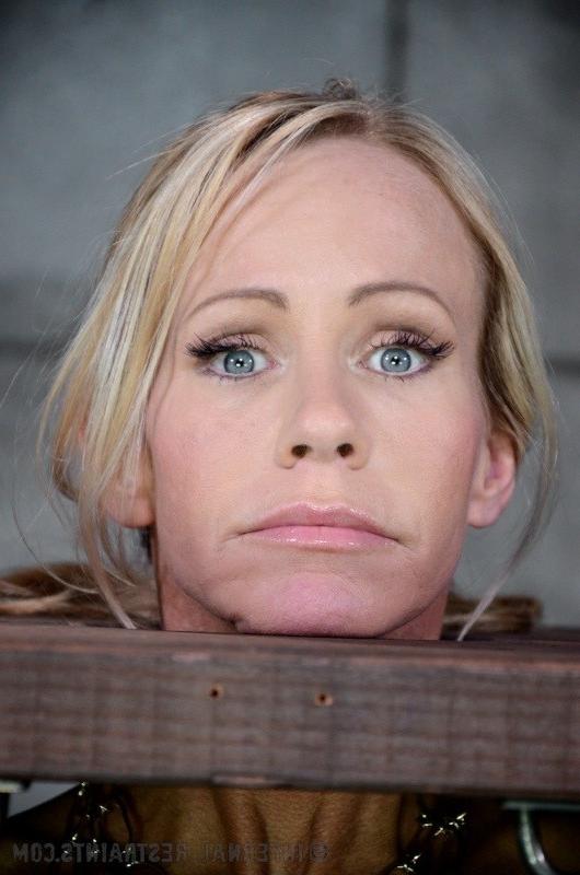 16P Simone Sonay blonde milf is chain and strap bound in bdsm dungeon