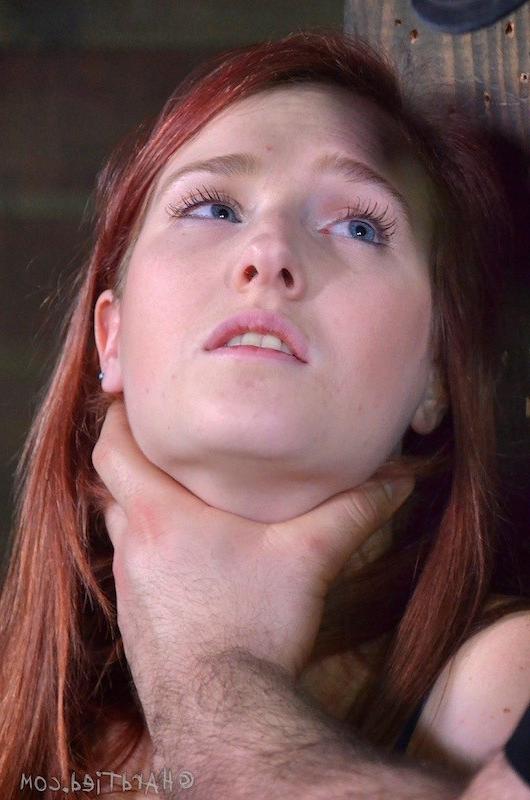 16P Ashley Lane redhead rope bound with tits exposed and ass toyed