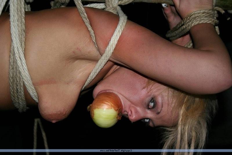 12P Blonde slave gets tied up to a stick