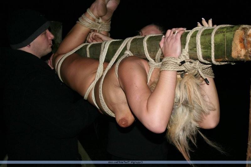 12P Blonde slave gets tied up to a stick