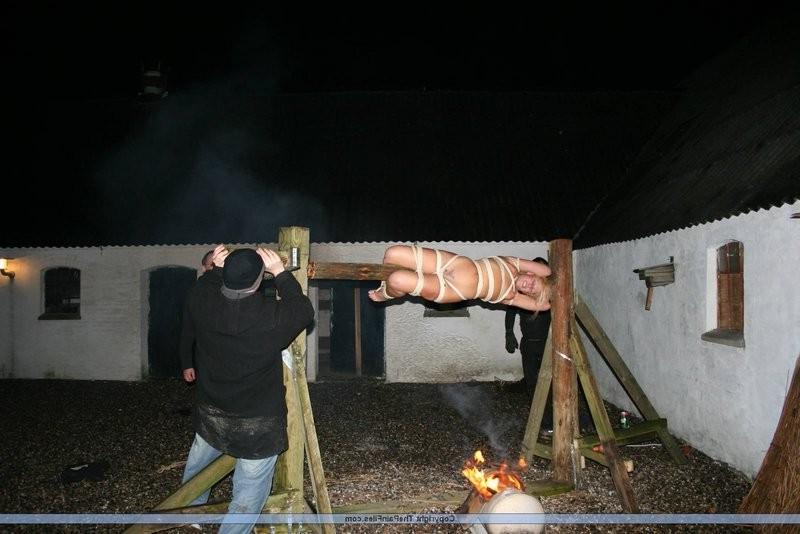 12P Blonde slave gets tied up to a stick