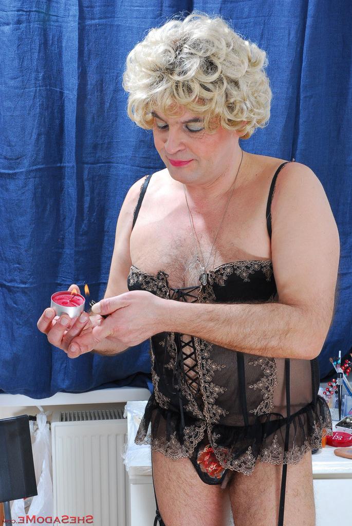 20P Stripped naked sissy in a blond wig gets his ass poked and probed by a lady