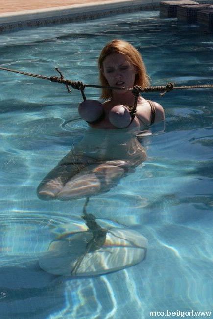 15P Slave girl tied up and pushed in the water