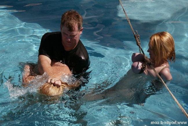 15P Slave girl tied up and pushed in the water