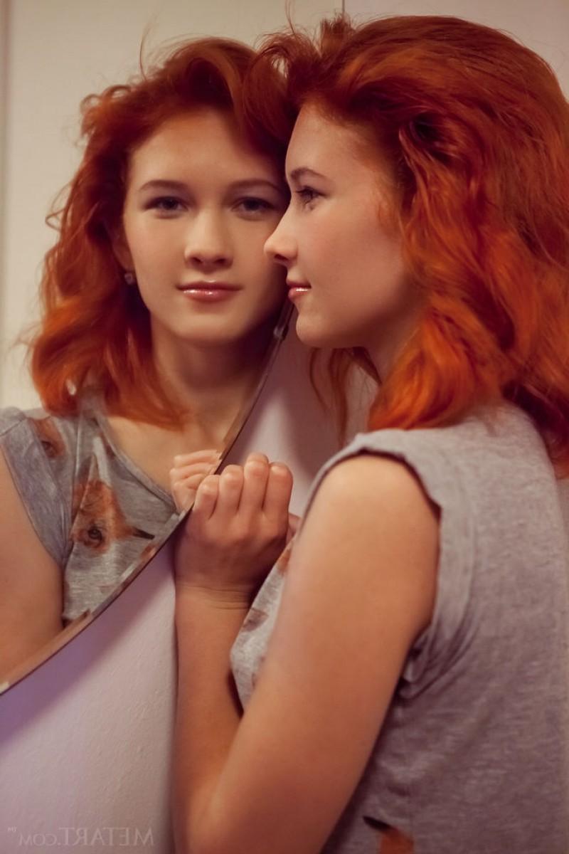12P Slim natural redhead in panties