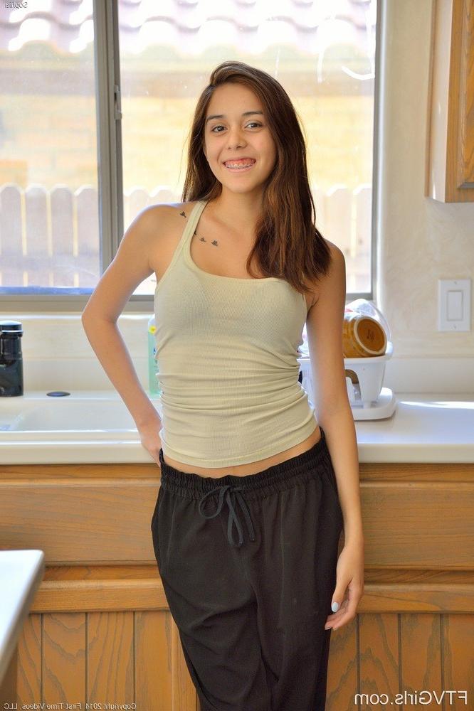15P Slender brunette cutie Sophia posing and spreading