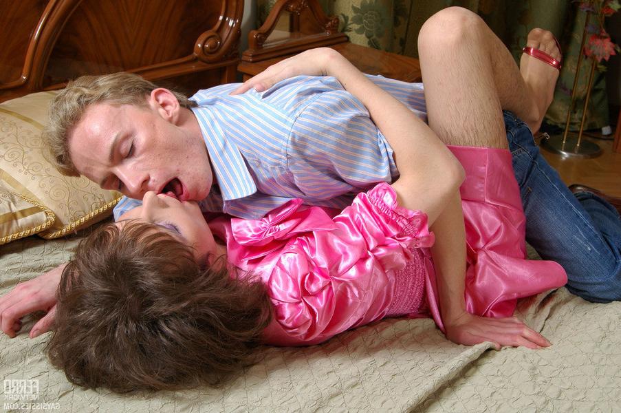 20P Nasty sissy in a lovely pink dress goes all the way after sensuous kisses