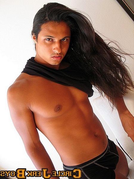 14P Stud with long hair shows off his huge cock