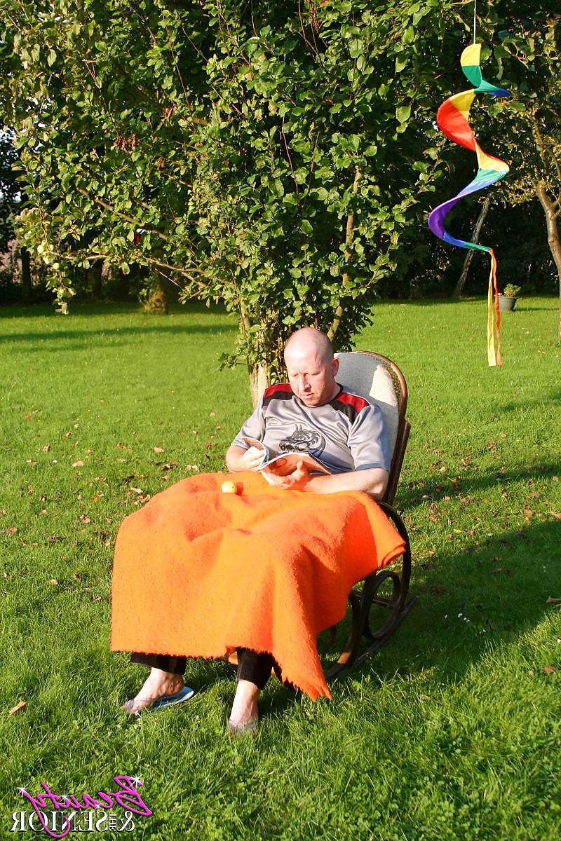 14P Blond daughter's friend with her farther in the garden