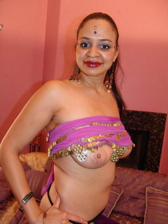15P Big tit Indian Lasmi pulls on her erect nips before riding a huge cock hard