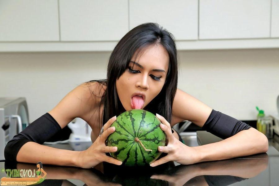 15P Ladyboy Longmint fucks a melon like a freak