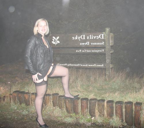 15P Mature lady sucking huge cock outdoor