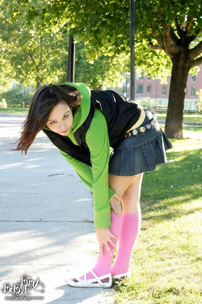 15P Cute teen girl in skirt flashing pussy outside