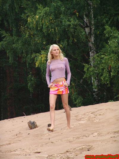 16P Beautiful teen peeing in the beach