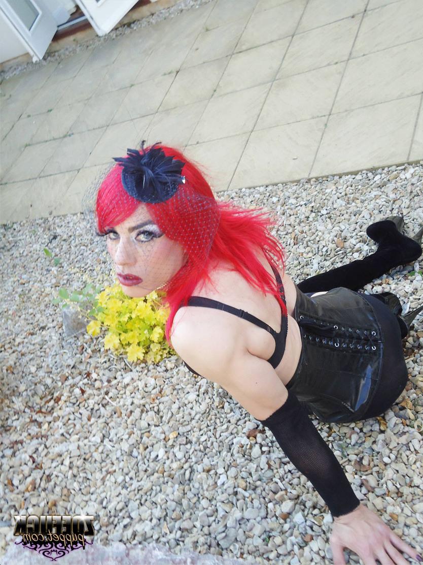 15P Gorgeous red head Zoe plays with her huge cock