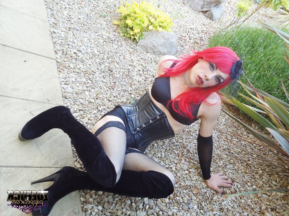 15P Gorgeous red head Zoe plays with her huge cock